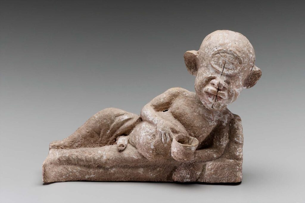 Greek terracotta figurine, Polyphemos reclining and holding a drinking bowl. Late 5th to early 4th century BC, Boeotia. Museum of Fine Arts, Boston.